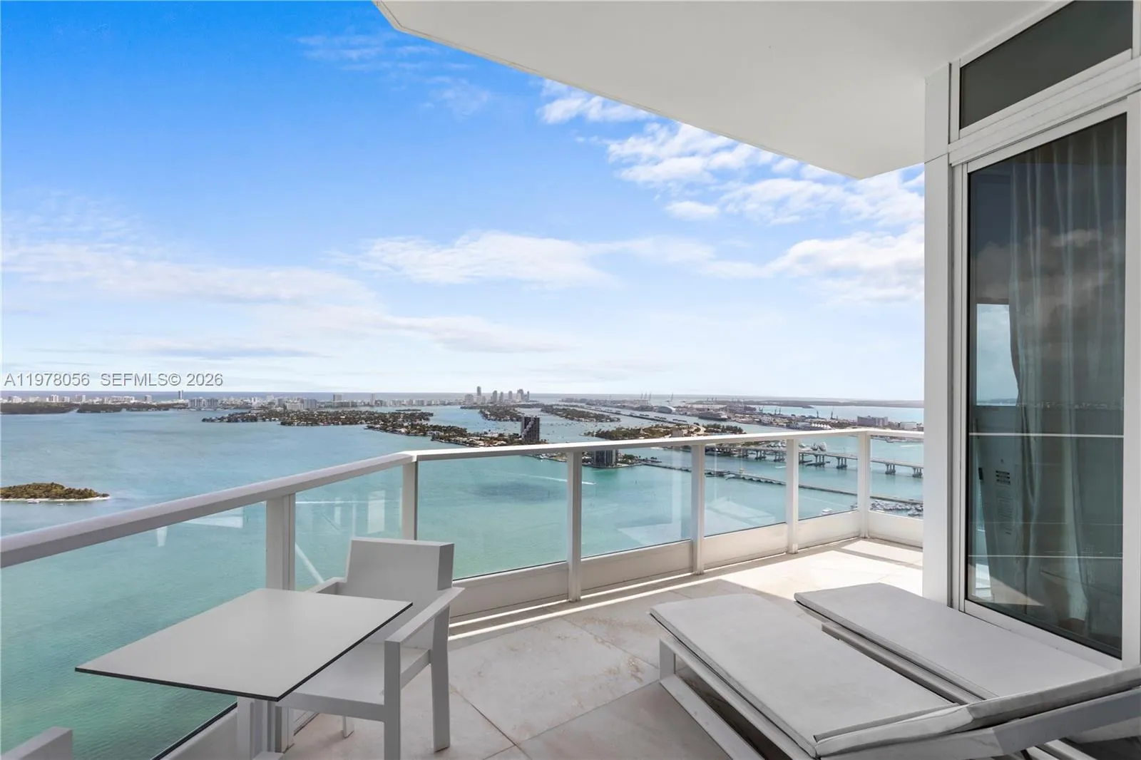 Master bedroom balcony. Panoramic views of Biscayne Bay and Miami Beach