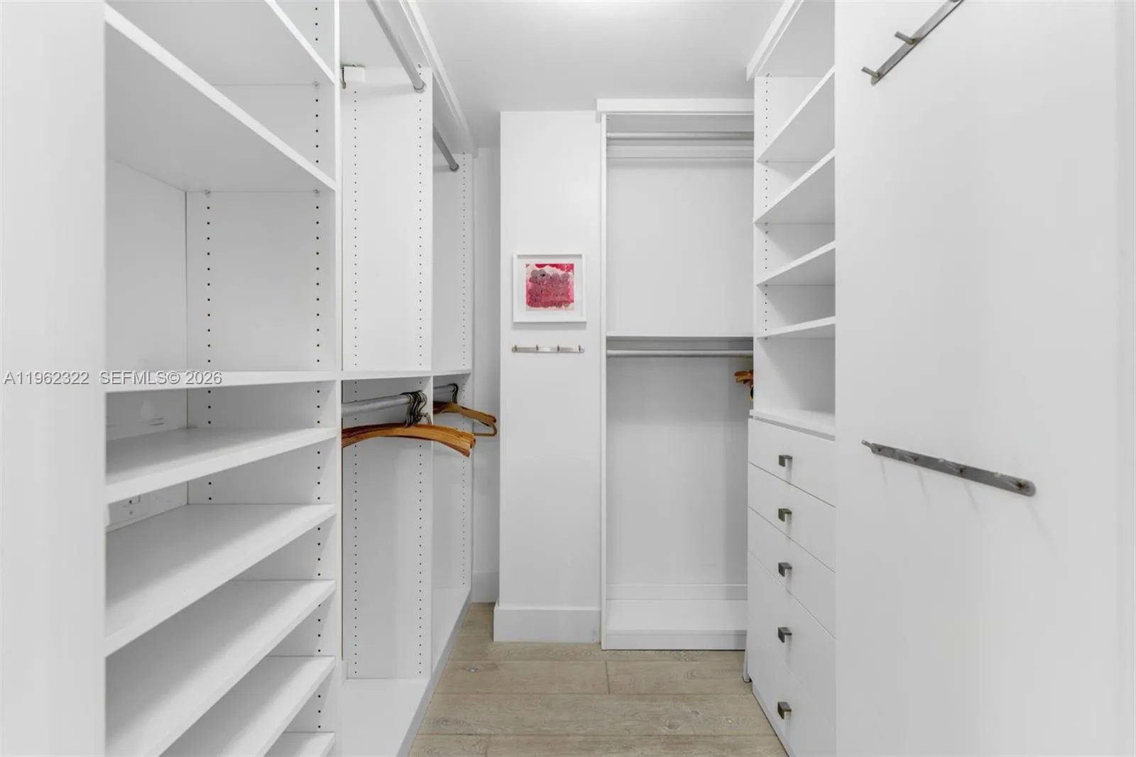 1 of 2 Primary walk in closet
