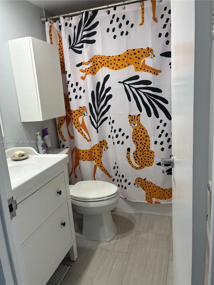 shower and tub master bedroom bathroom plus you have half bathroom in unit too