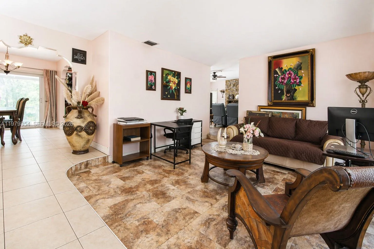 THIS IS THE VIEW AS YOU ENTER THE FRONT DOOR WHICH LEADS TO THE DINNING AND KITCHEN AREA