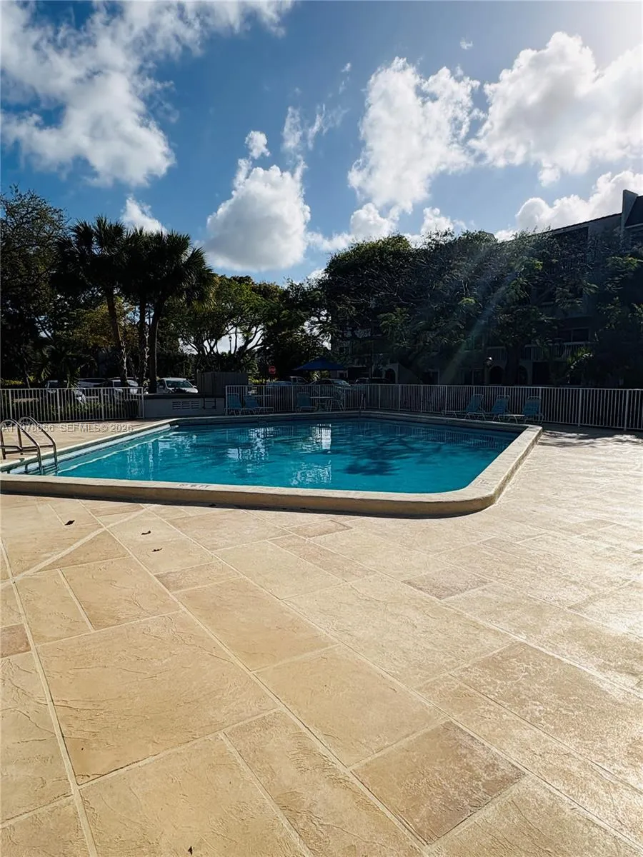 Pool located Next to Unit Building