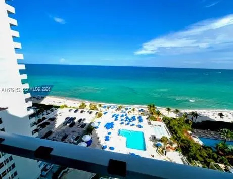 Full sunny pool deck and moving shoreline ocean views
