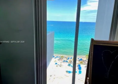 third bedroom with direct ocean floor-to-ceiling views