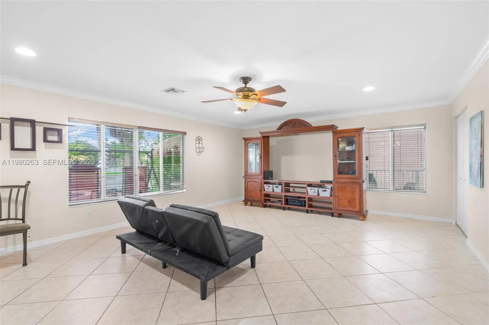 Big waterfront family room overlooking pool