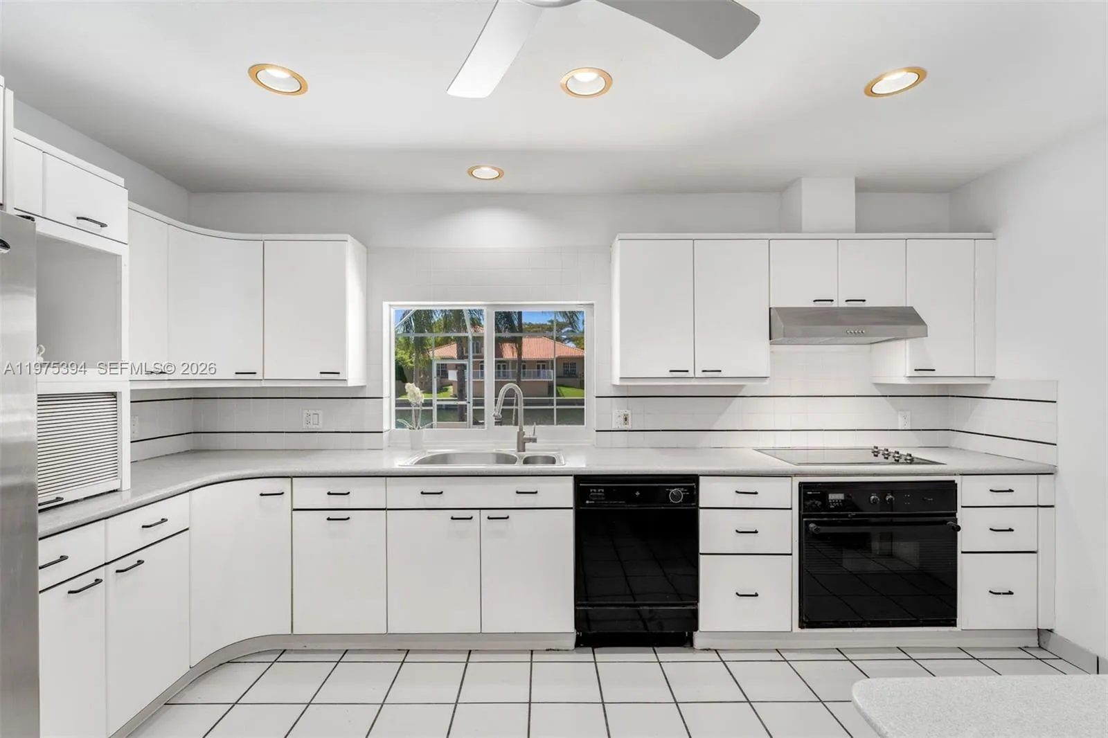Kitchen with passthrough bar