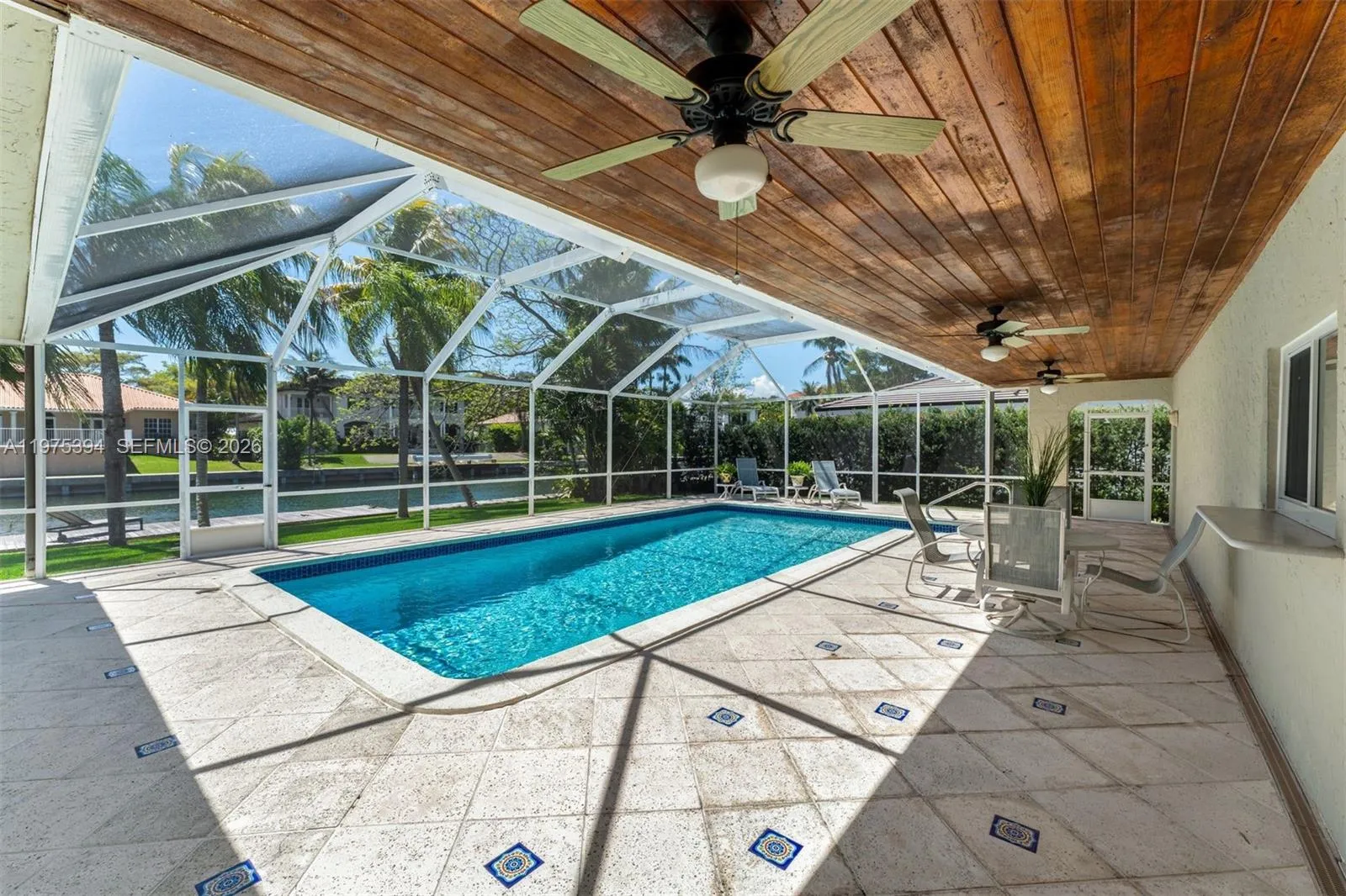 Covered veranda faces south for comfortable sun exposure