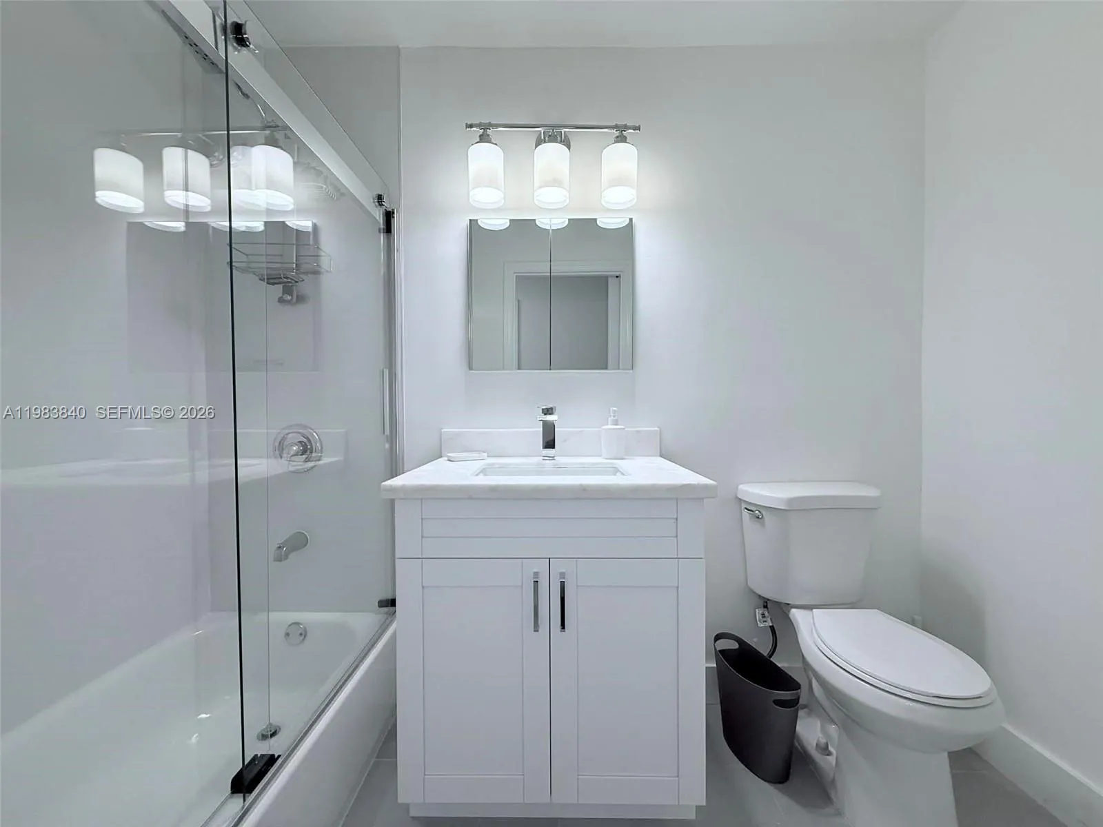 Guest bathroom with bathtub.