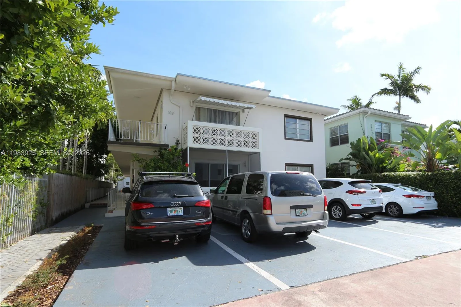 Building exterior w/ assigned parking space