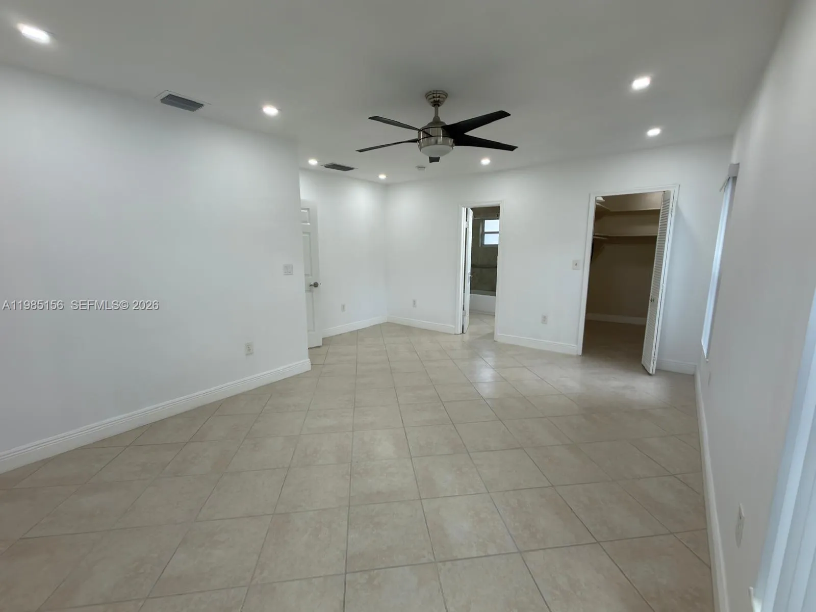 Master Bed with walk-in closet