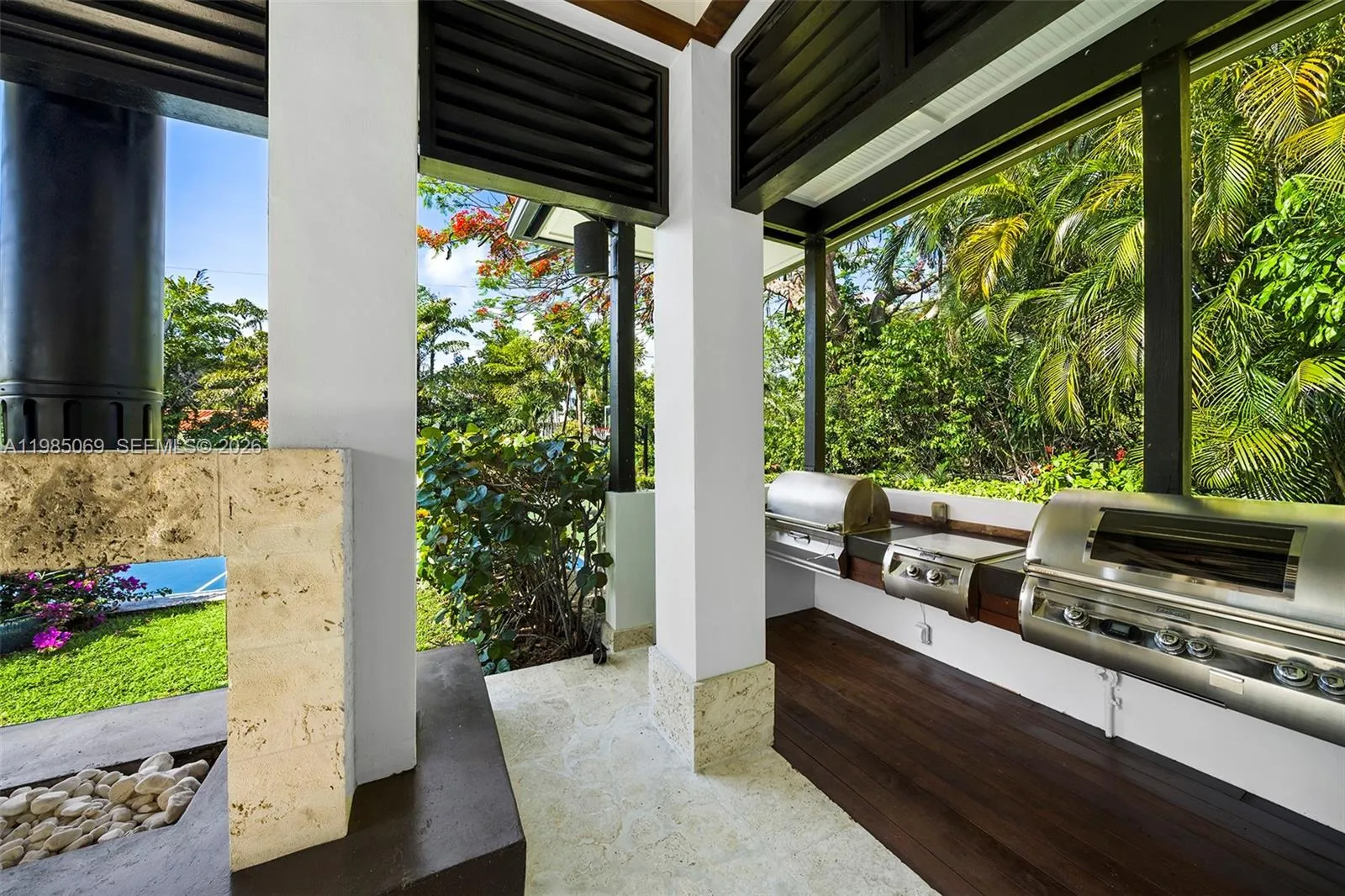 Oversized wood burning fireplace & 42\" gas grill, 32\" charcoal grill, 18\" gas burner