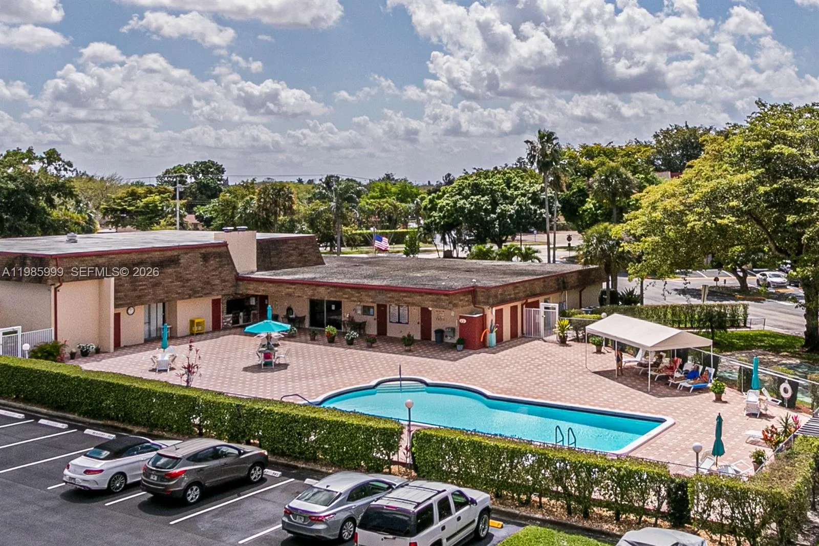VIEW OF POOL FROM FRONT DOOR