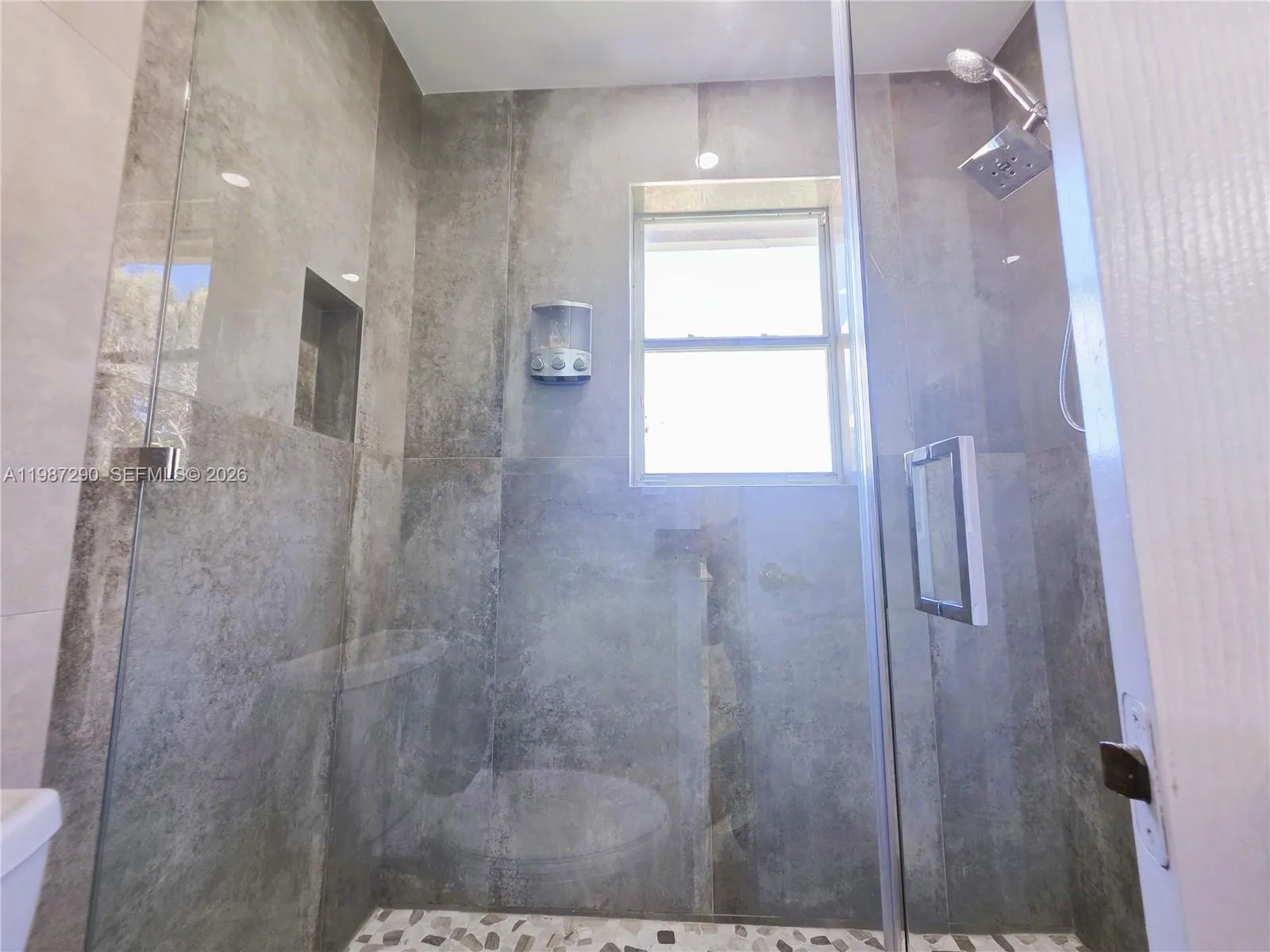 Shared Bathroom Shower between 2nd and 3rd Bedroom