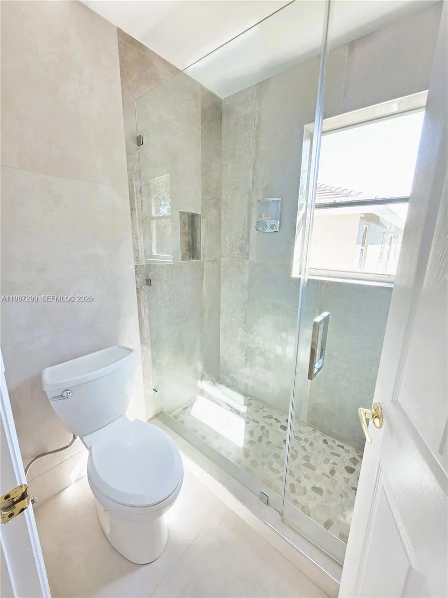 Shared Bathroom Shower between 2nd and 3rd Bedroom