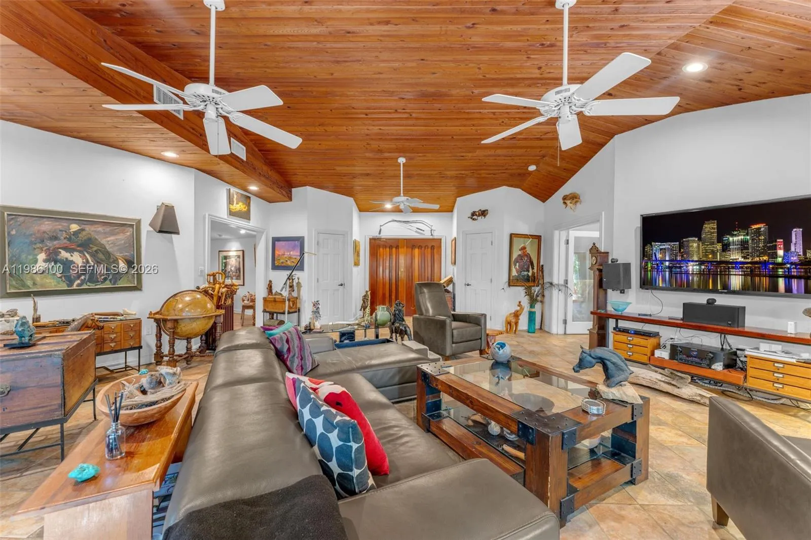 VIEW OF LIVING (SOME FURNISHINGS MAY BE NEGOTIABLE). THE CENTER ROTUNDA PER SE..