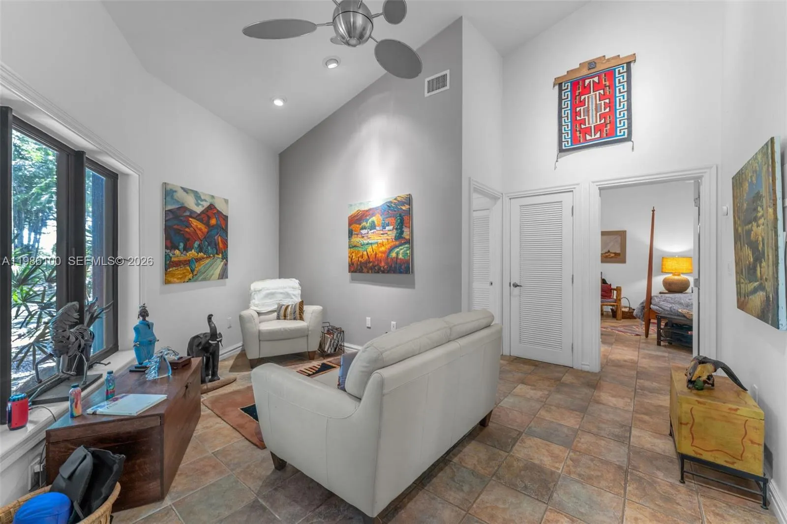 OPENS TO COVERED BREEZEWAY AND PATIO