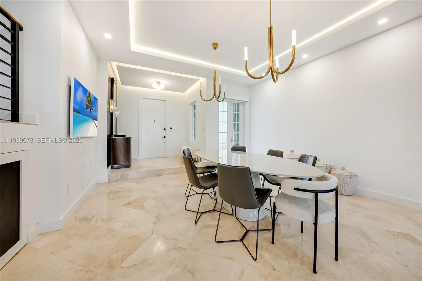 Modern dining room welcomes you to this modern home in Aventura Lakes
