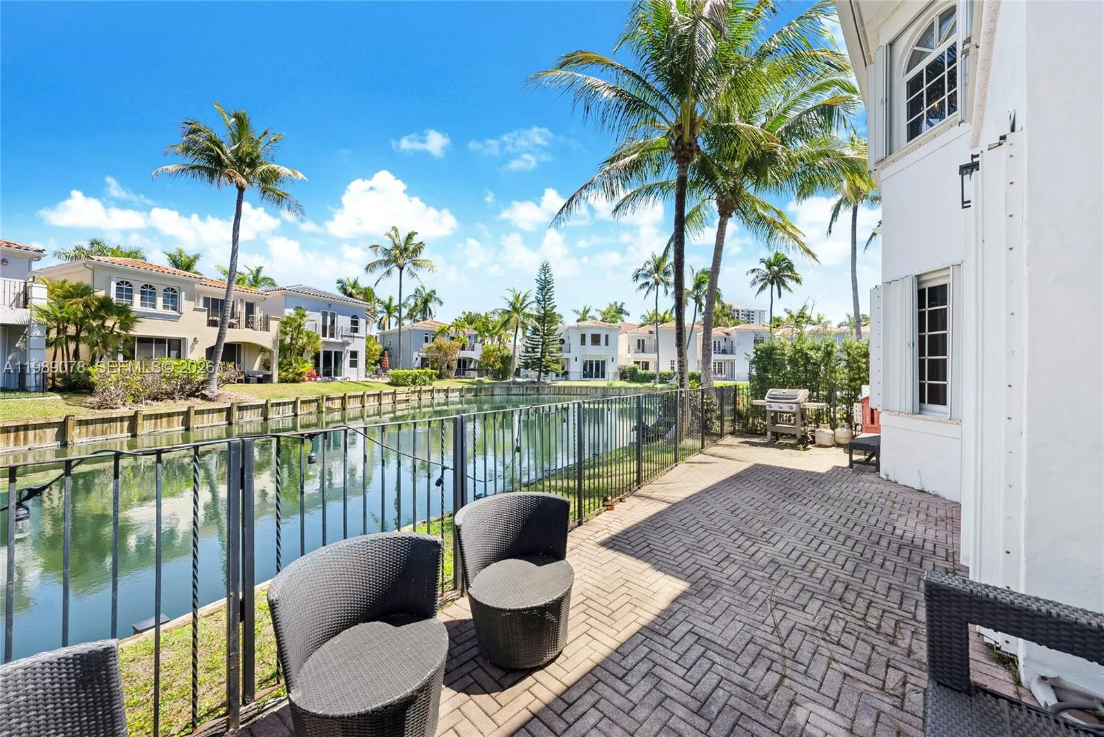Beautiful sunny Florida days can be enjoyed from this expansive patio with water view of canals
