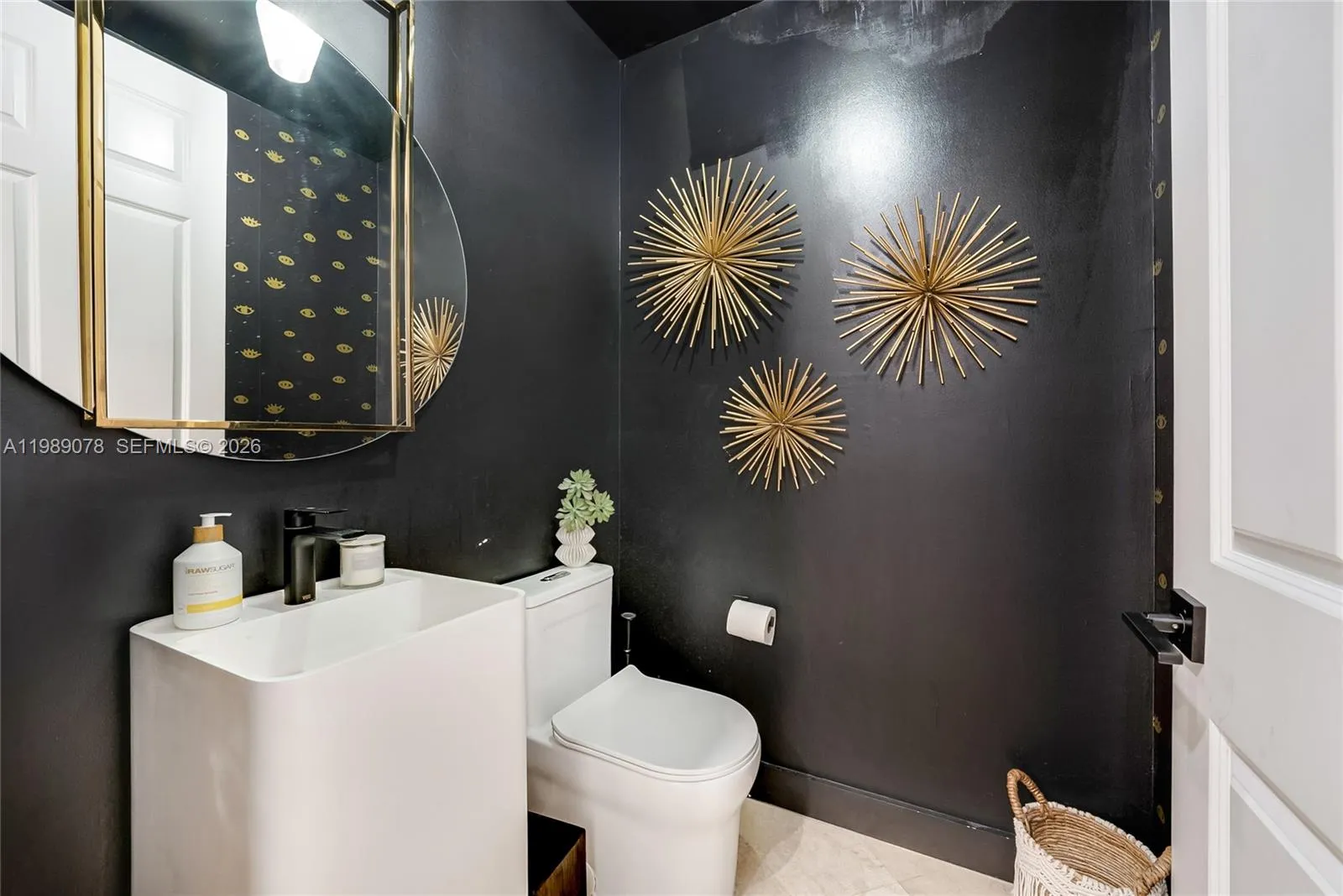 Designer powder room with high end fixtures to welcome your guests
