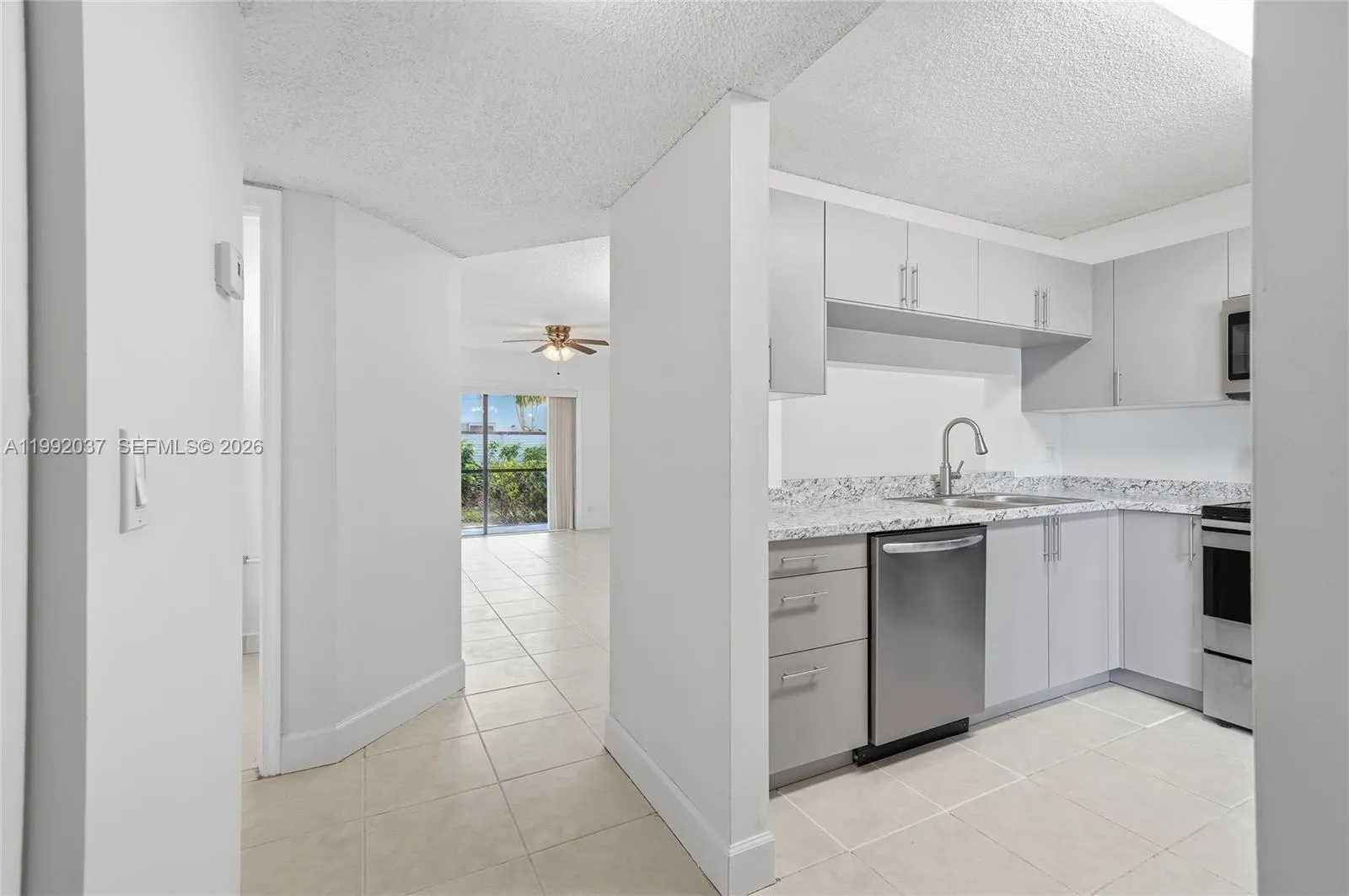 Bright kitchen with clean finishes and ample cabinet space
