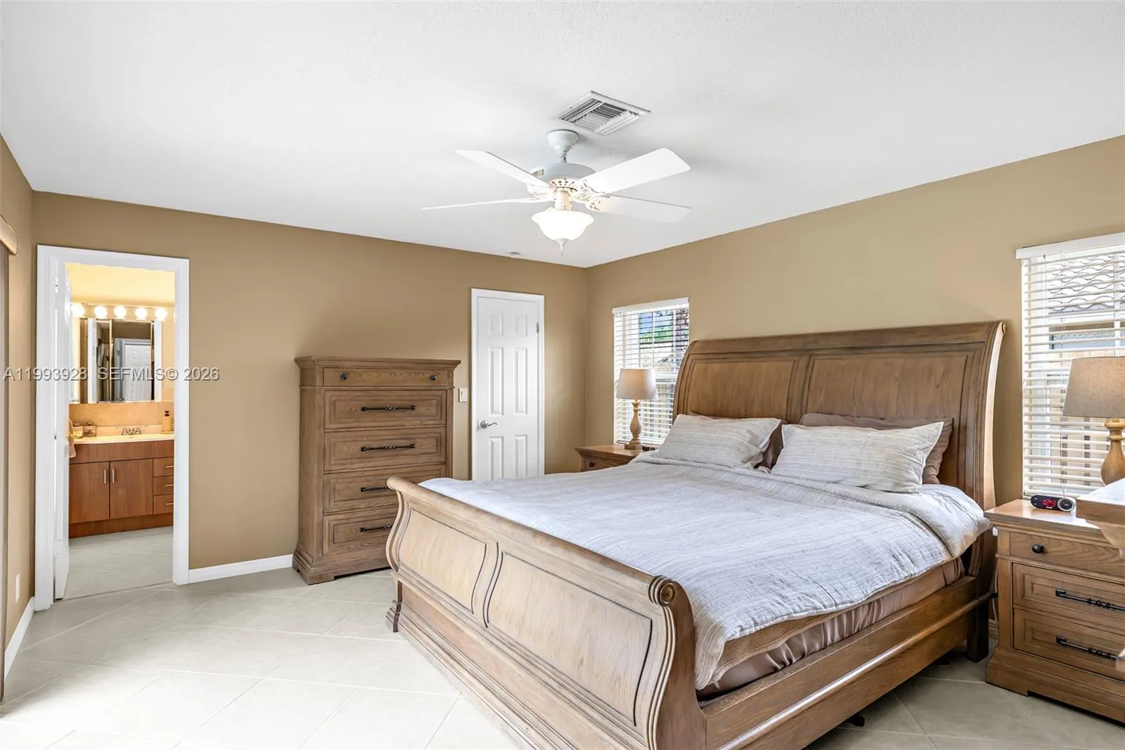 PRIMARY BEDROOM WITH ACCESS TO POOL