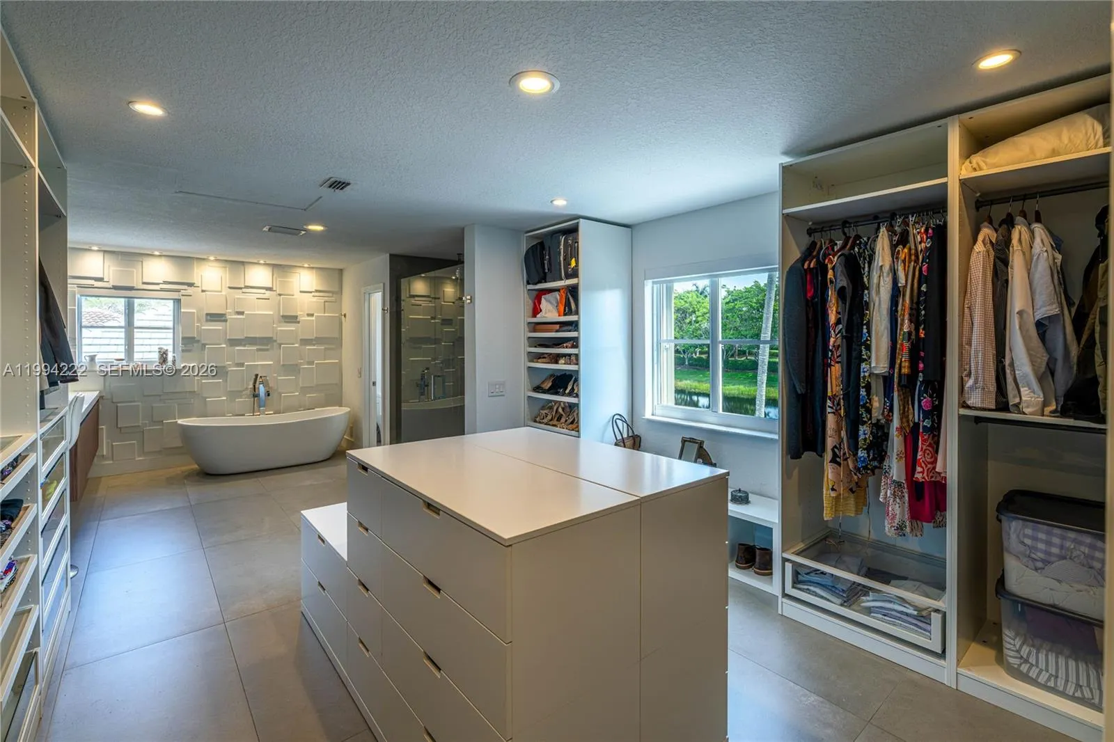 Primary bathroom + stunning walk-in closet