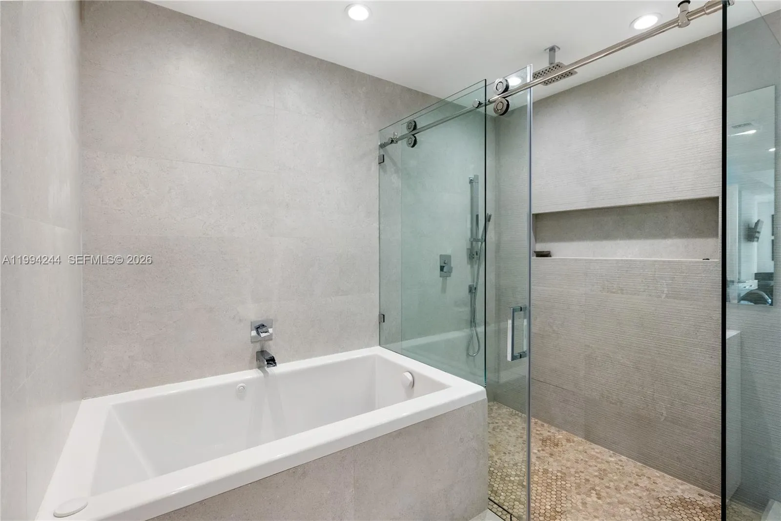 Main bathroom has both a shower and a bathtub