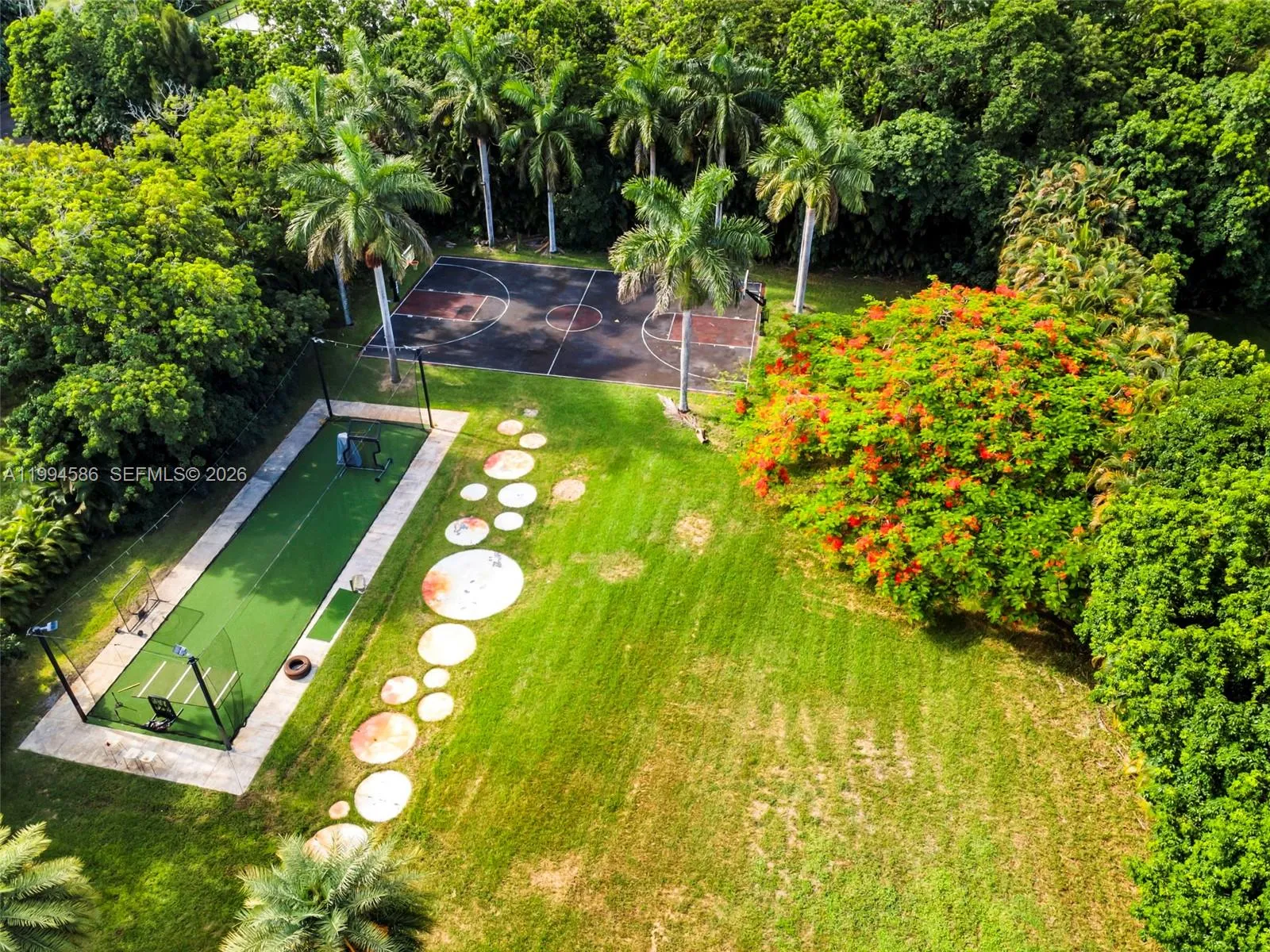 Full size basketball court and MLB regulation size batting cage.