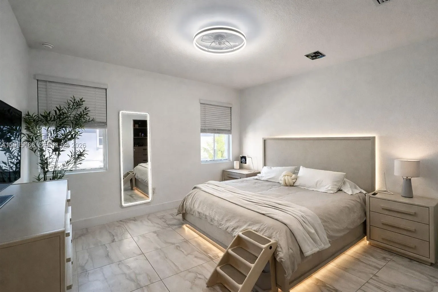Spacious primary suite with abundant natural light
