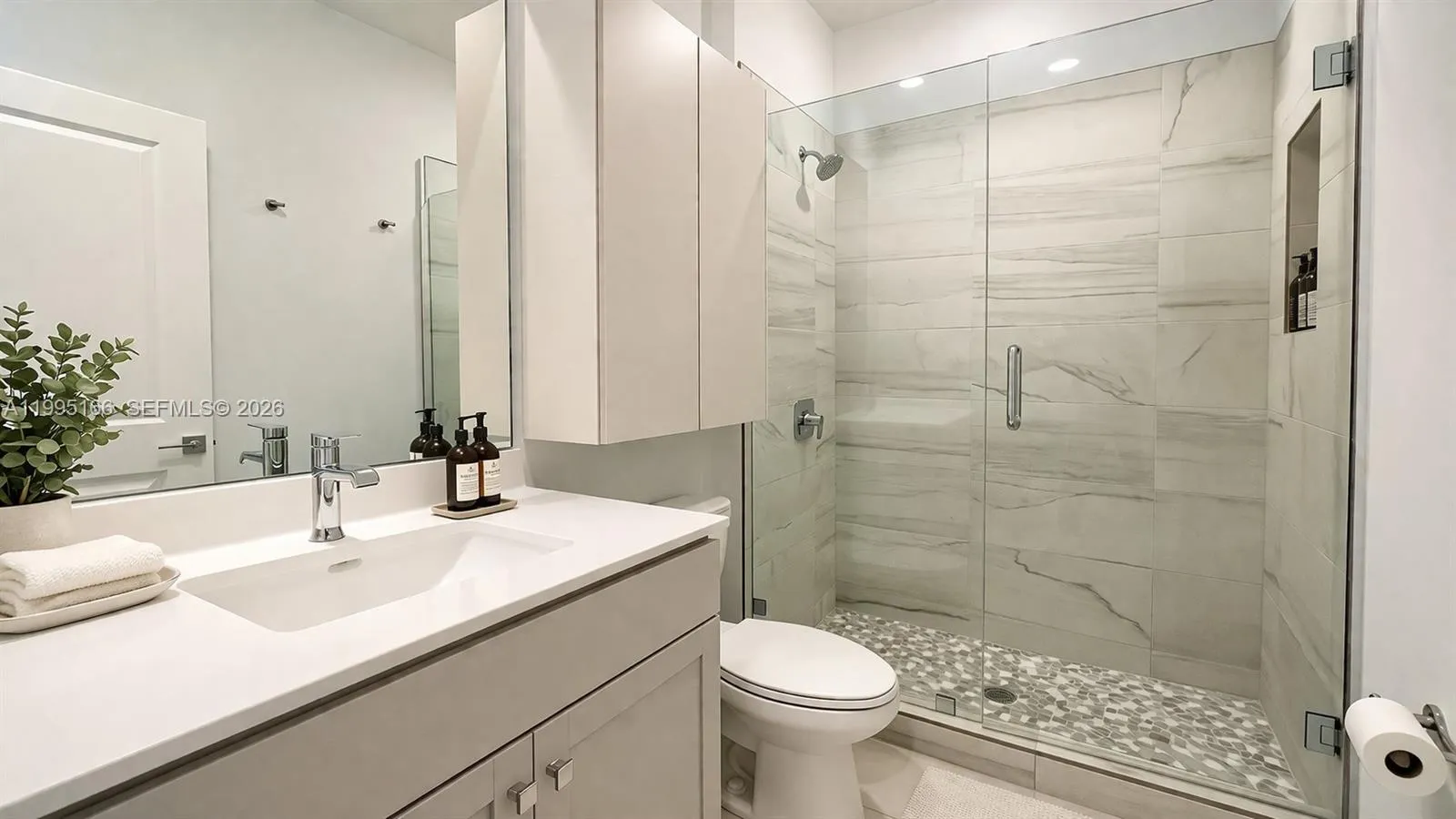 Well-maintained bathroom serving secondary bedrooms