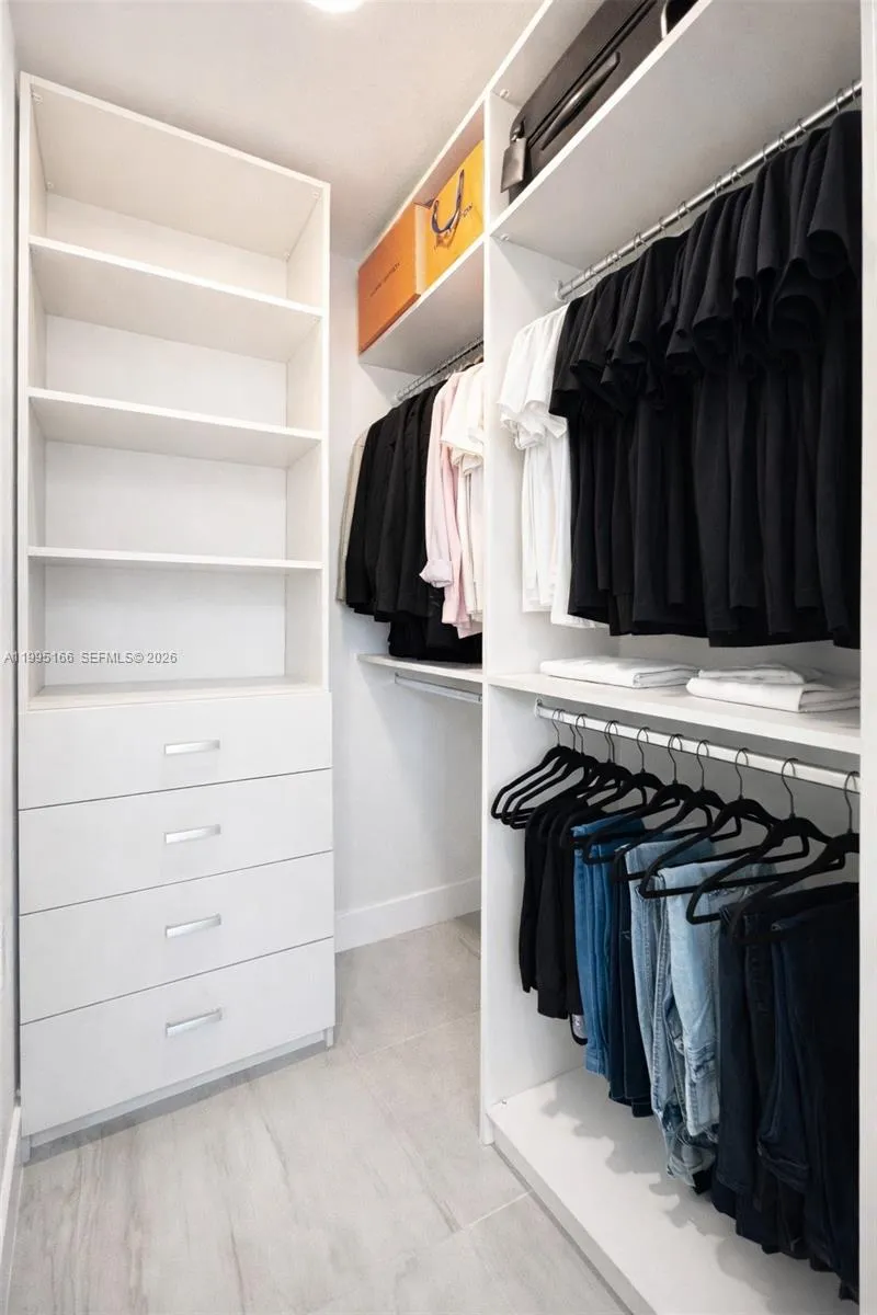Custom-designed closet maximizing storage and organization