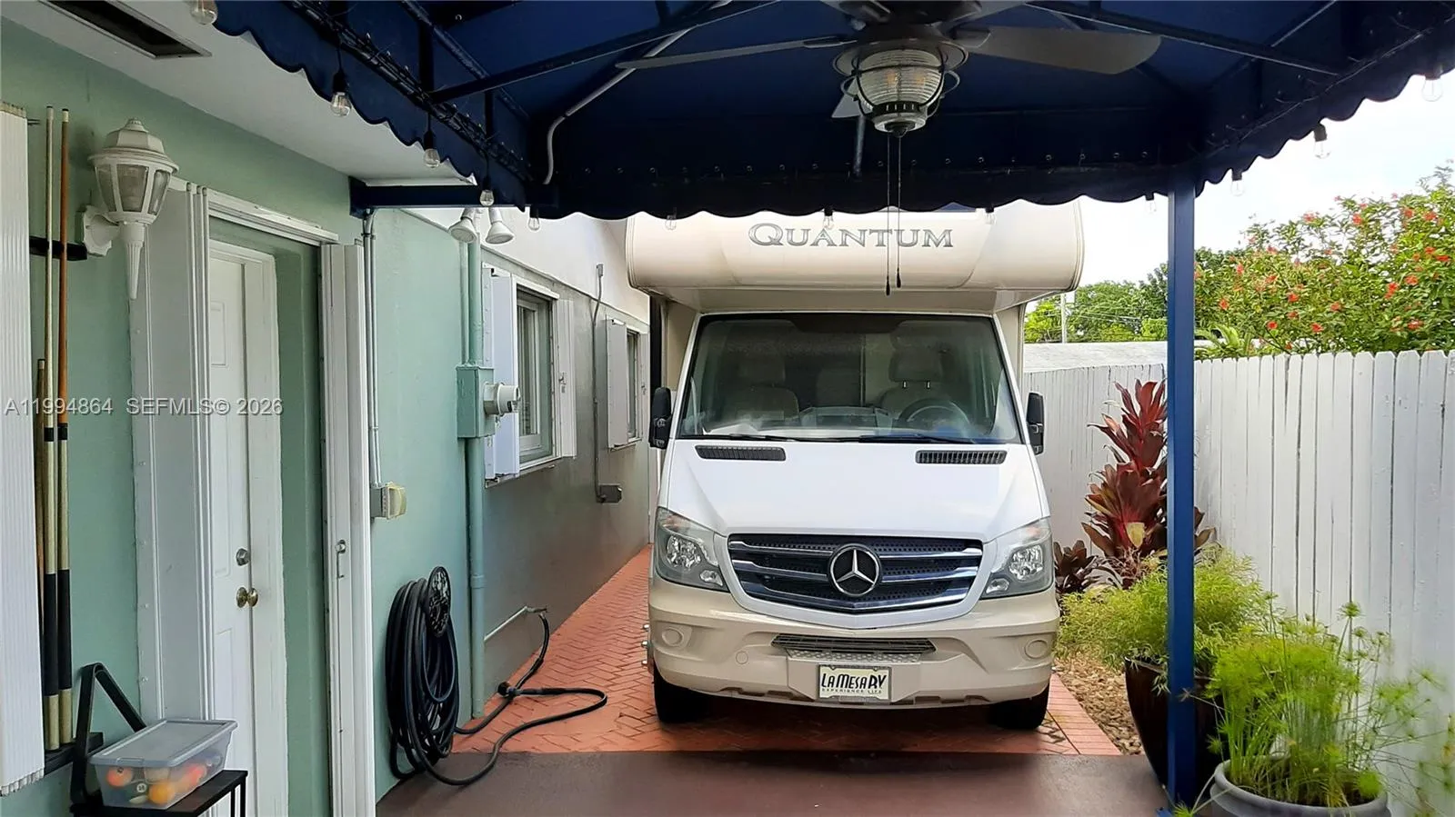 Driveway / carport w/ RV/EV hookup