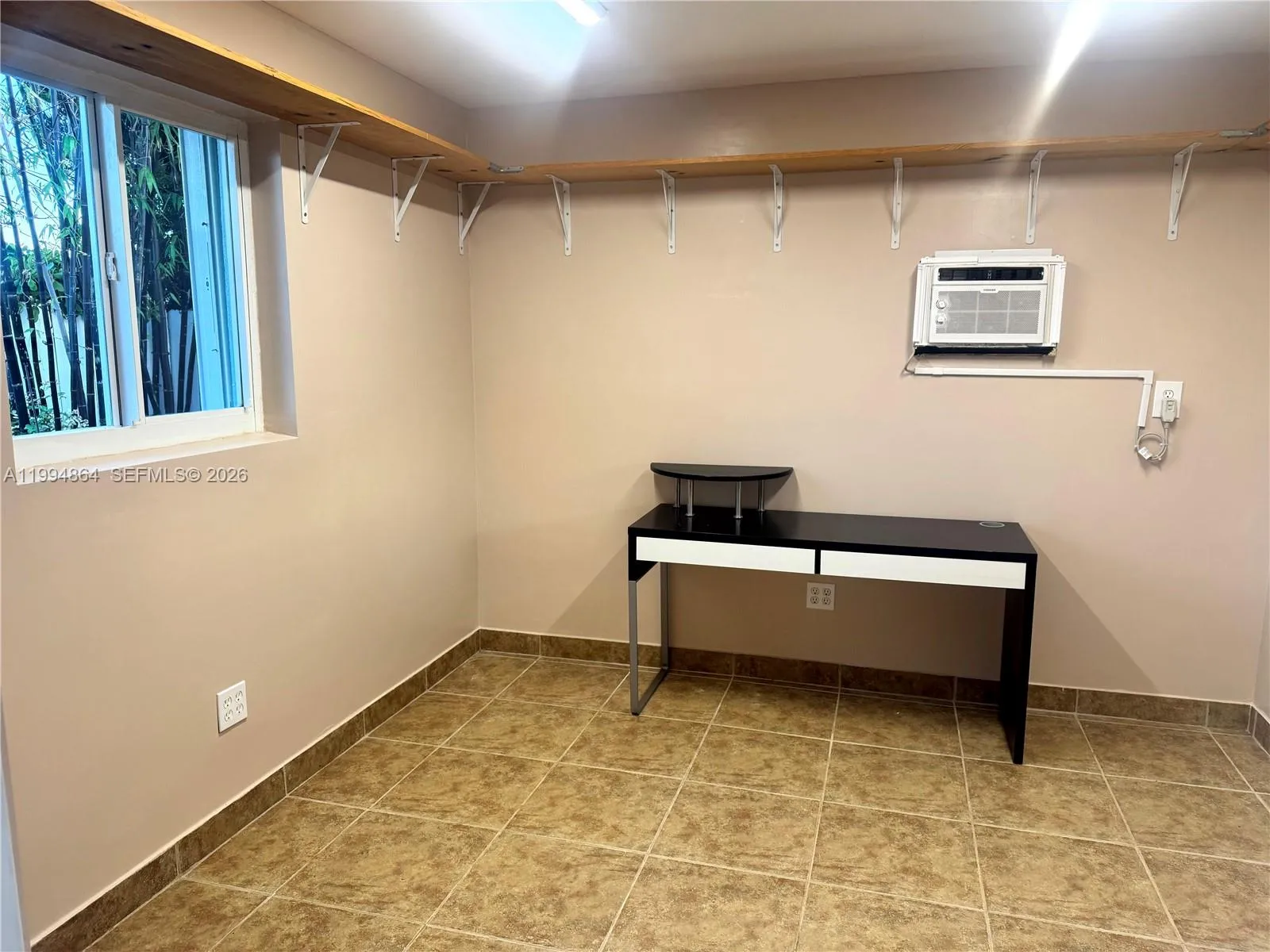 Spacious and tiled throughout