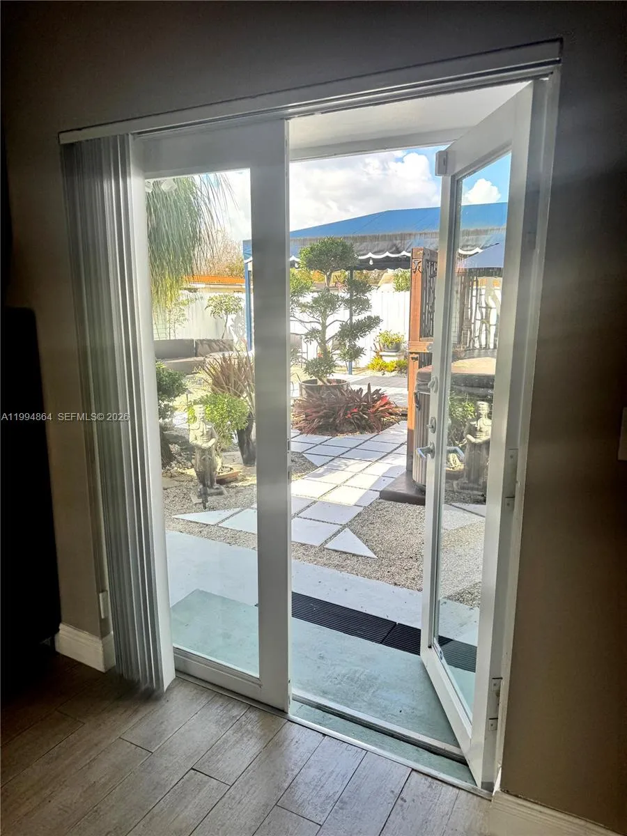 French doors to backyard