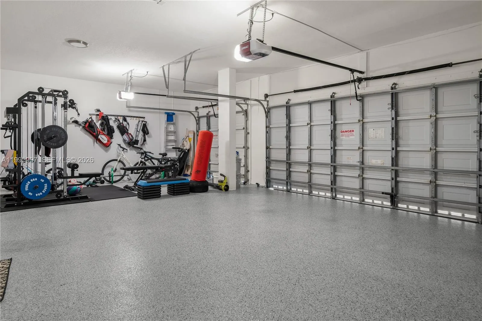 Triple car garage. Amazing space for storage or gym!