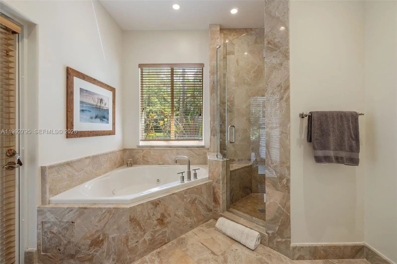 Jack & Jill Bathroom with Access to Screened Patio