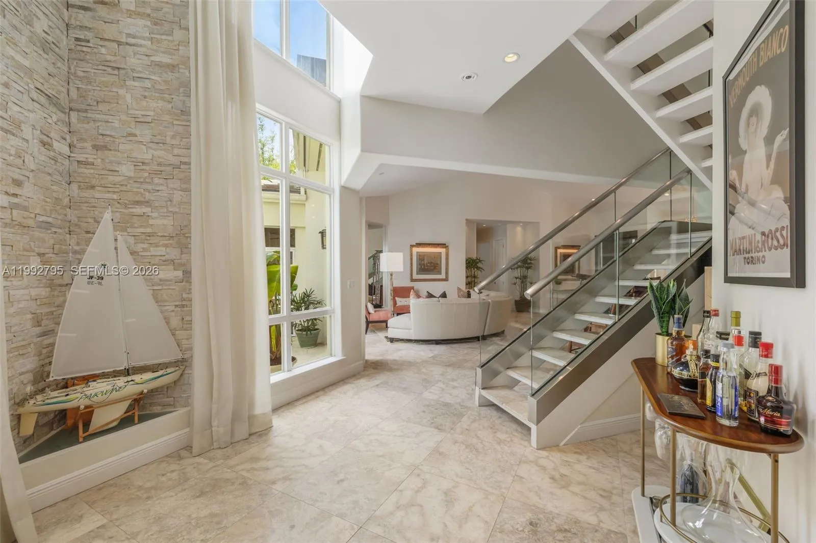 Expansive Walls of Windows (impact) Throughout