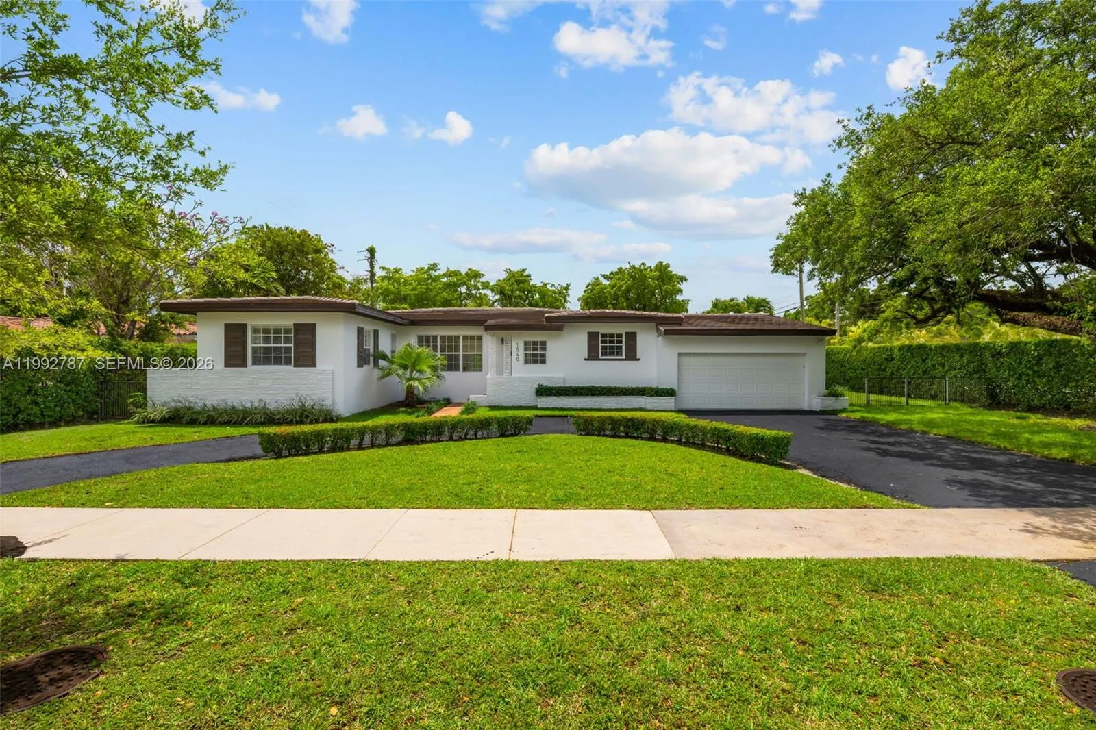 Front of Home with Long Circular Drive