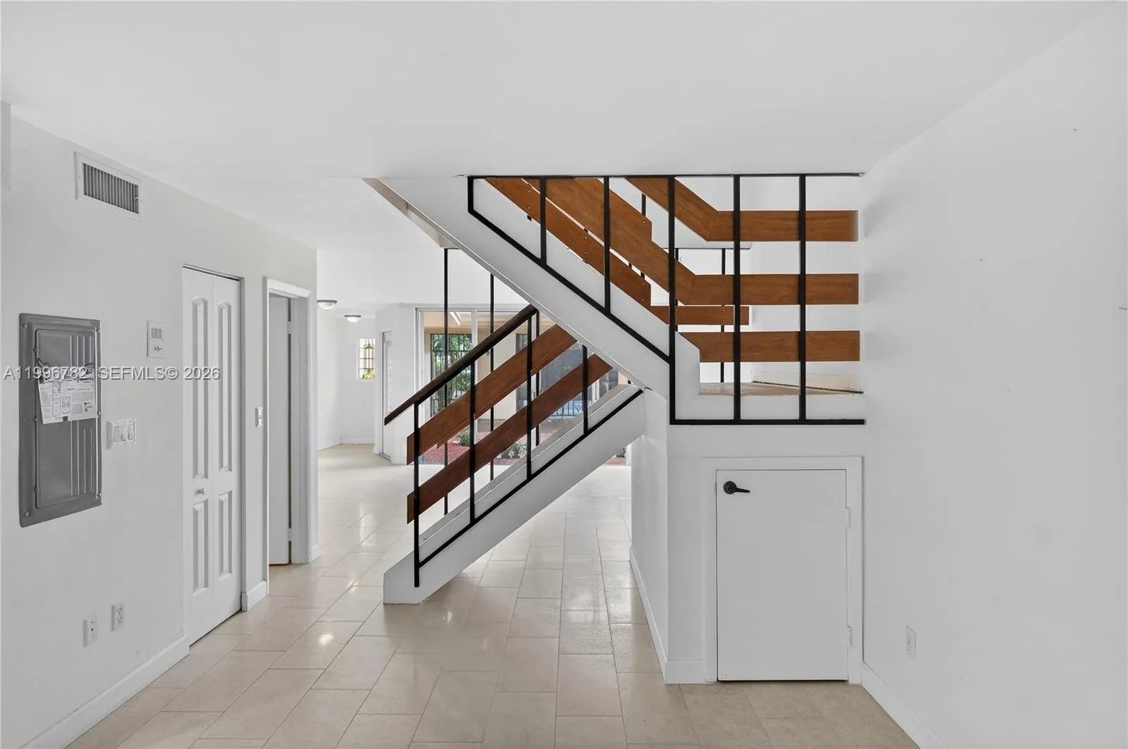 Stair case in the middle of first floor
