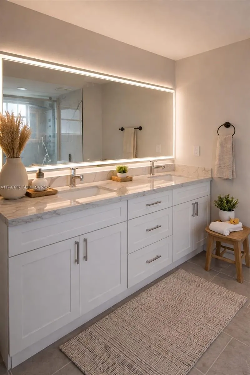 Master bathroom with dual sinks.