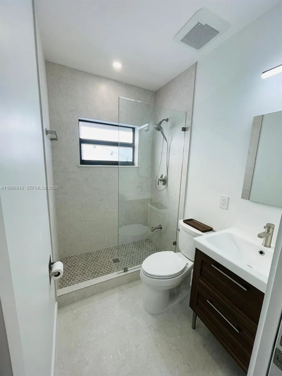 “Brand-new, fully renovated bathroom featuring contemporary design and stylish finishes.”