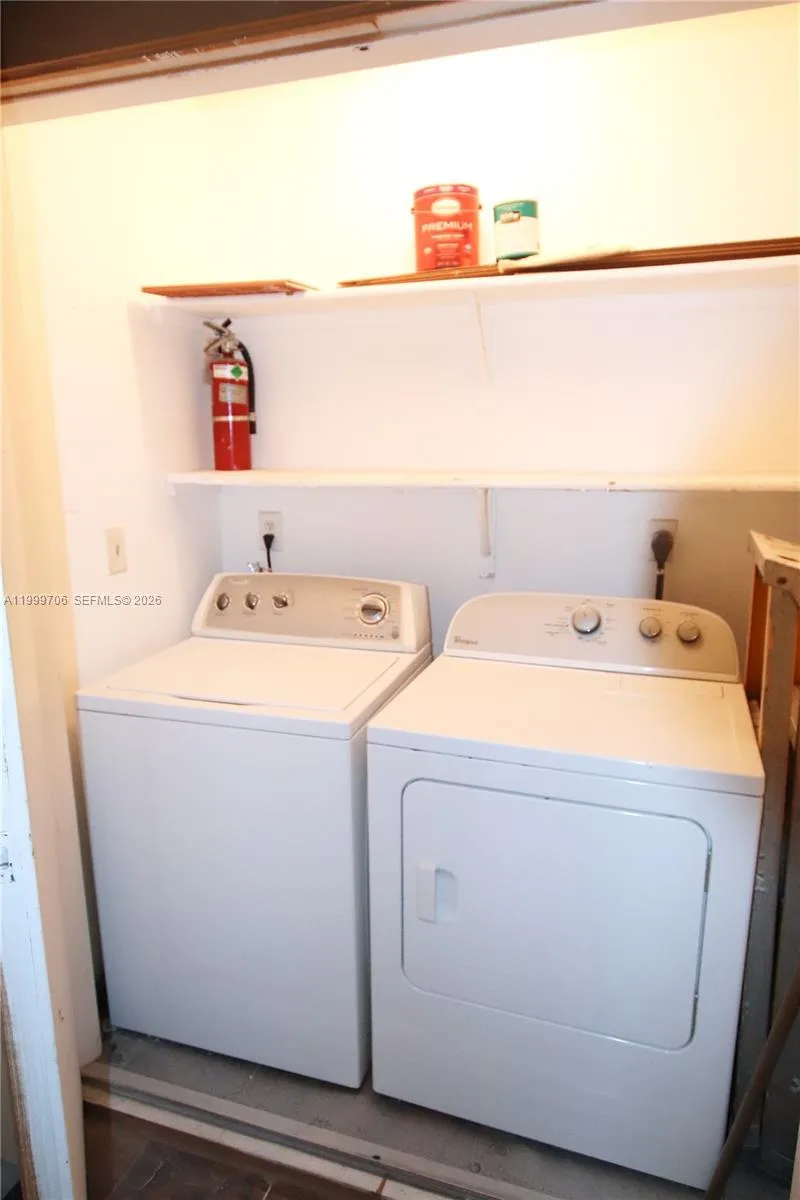 Full size washer and dryer with storage space