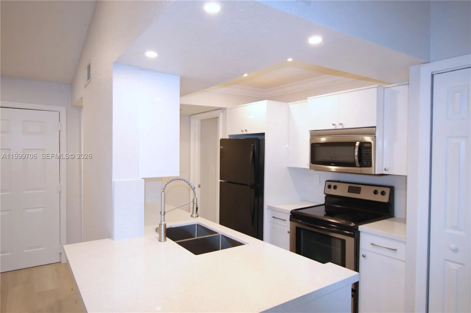 Kitchen with new cabinets and new quartz top