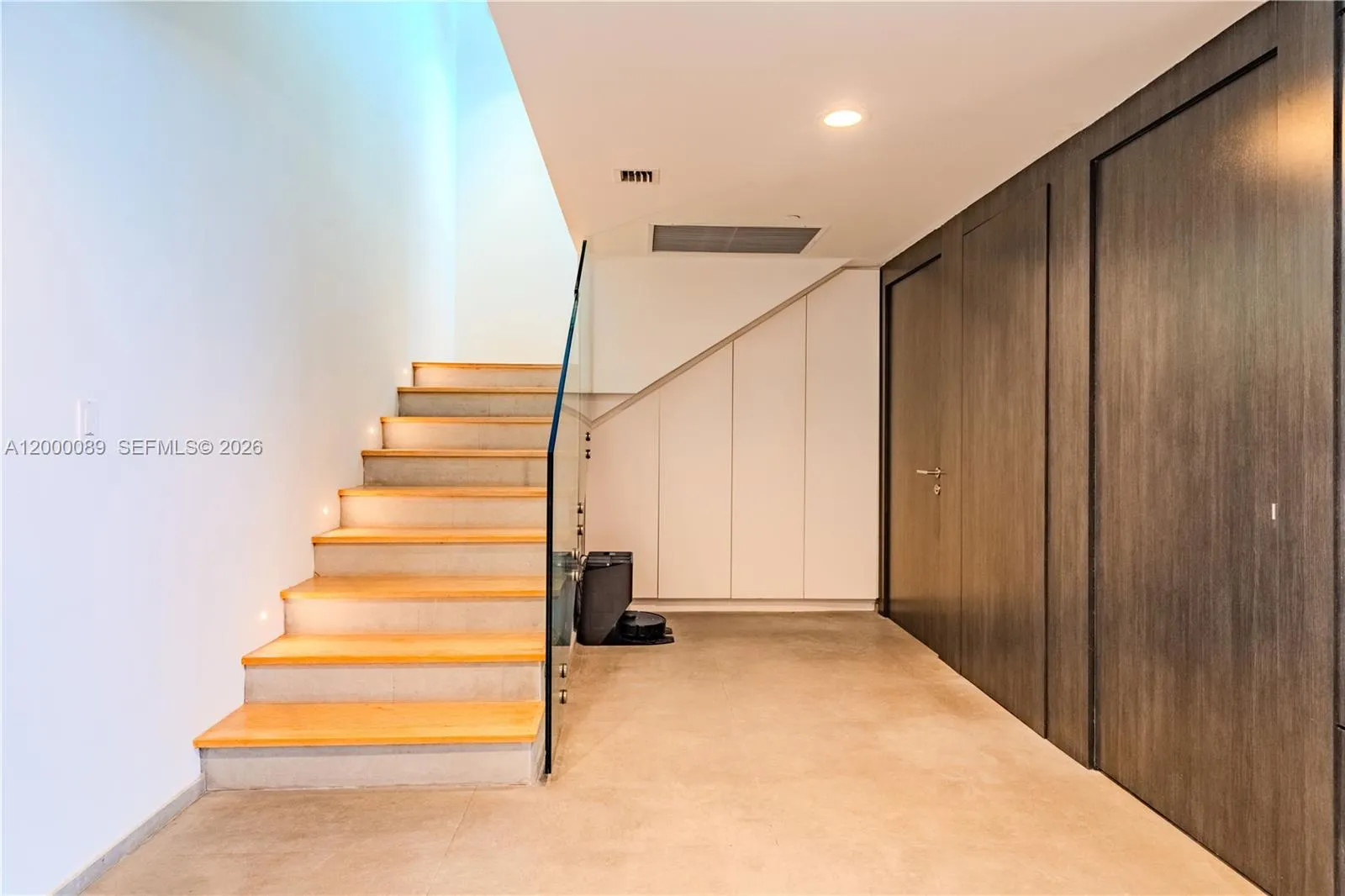 stairs leading to upper penhouse level