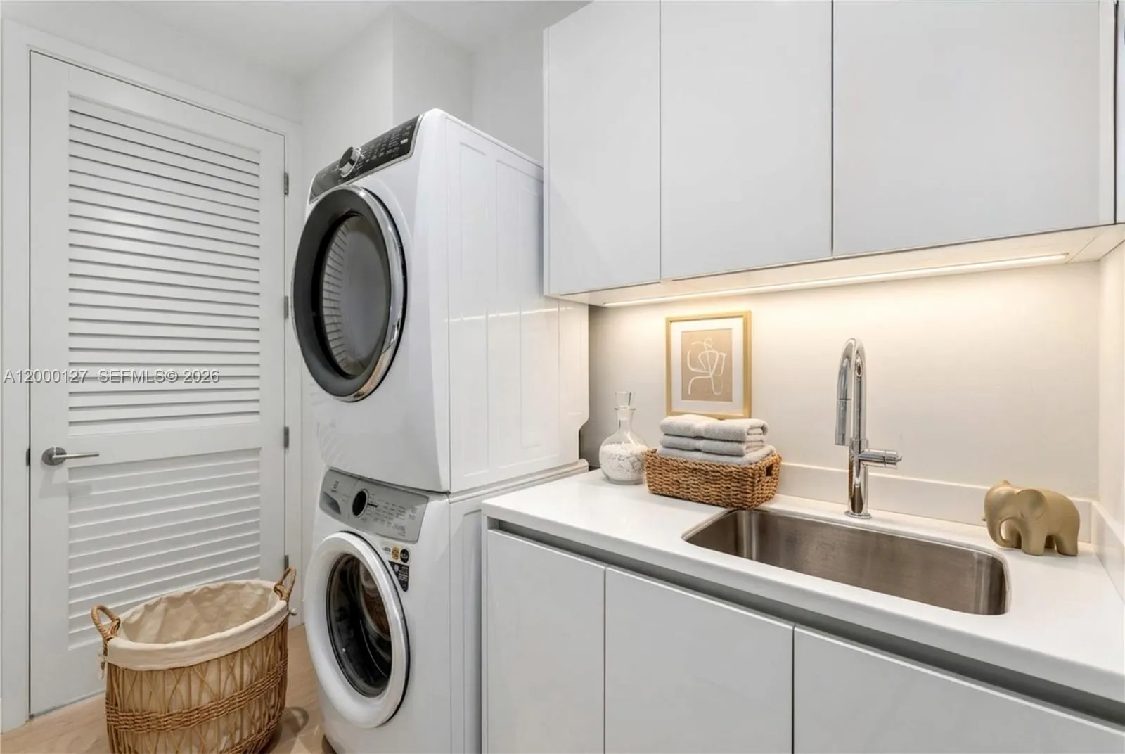UNA Residences Brickell. Laundry Room. Virtually Staged.