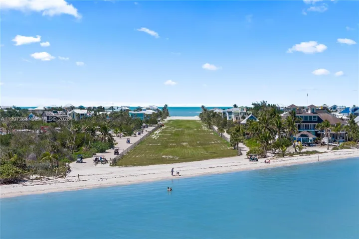 View of the airstip and some of the stunning beach homes on the island tip.