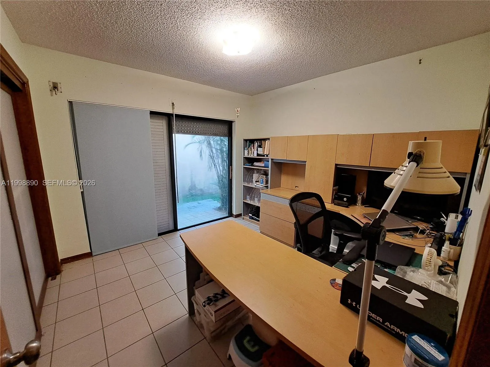 3rd Bedroom with Accordion Rollup shutters