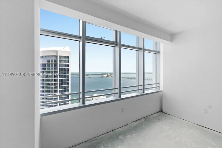 Water views from primary bedroom