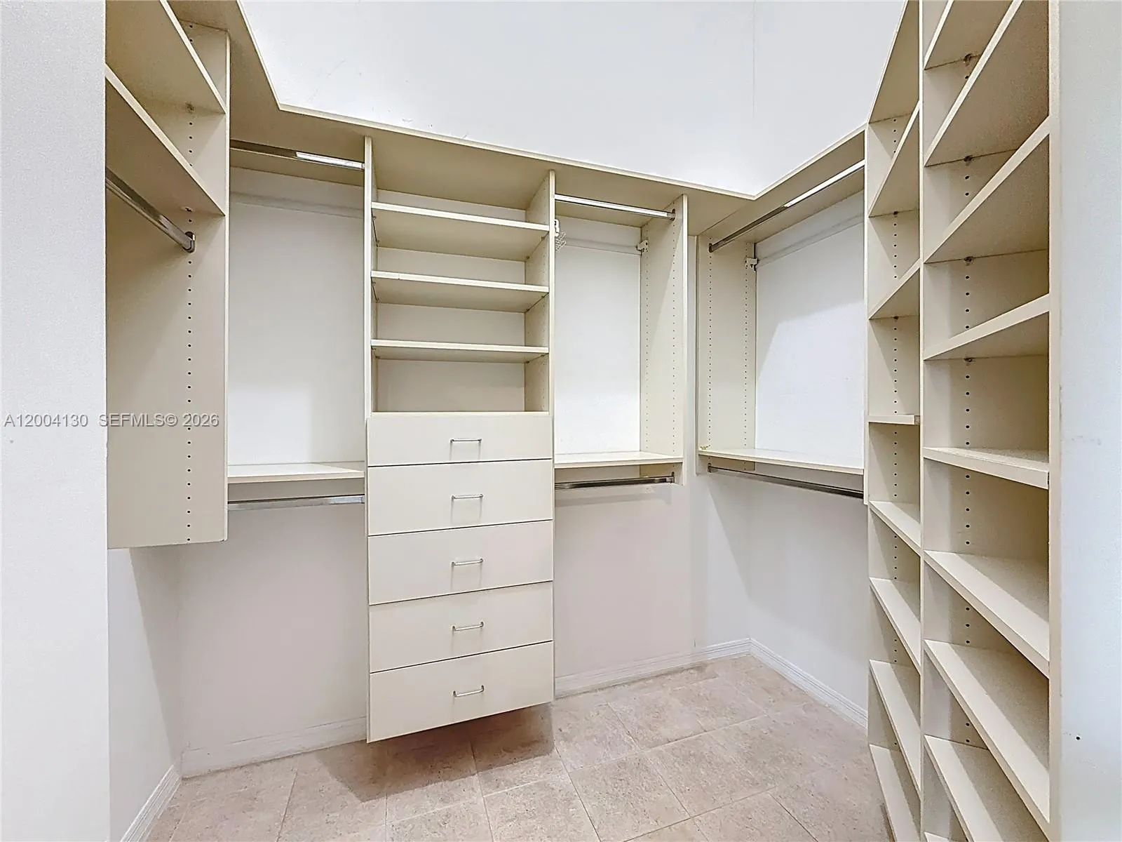 Primary bedroom Her closet