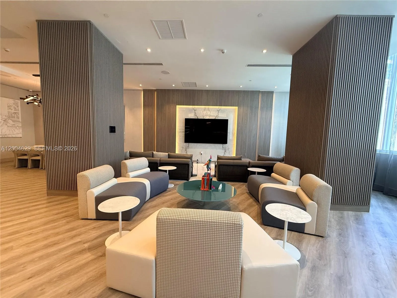 Relax in the stylish TV lounge, designed for comfort and entertainment.