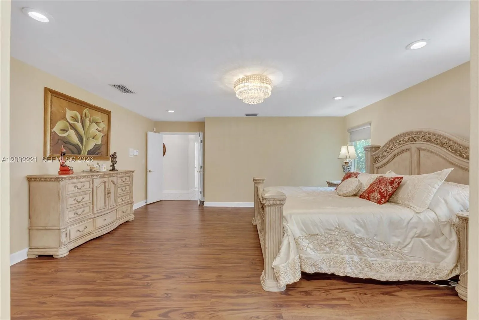 Main bedroom with double door entry